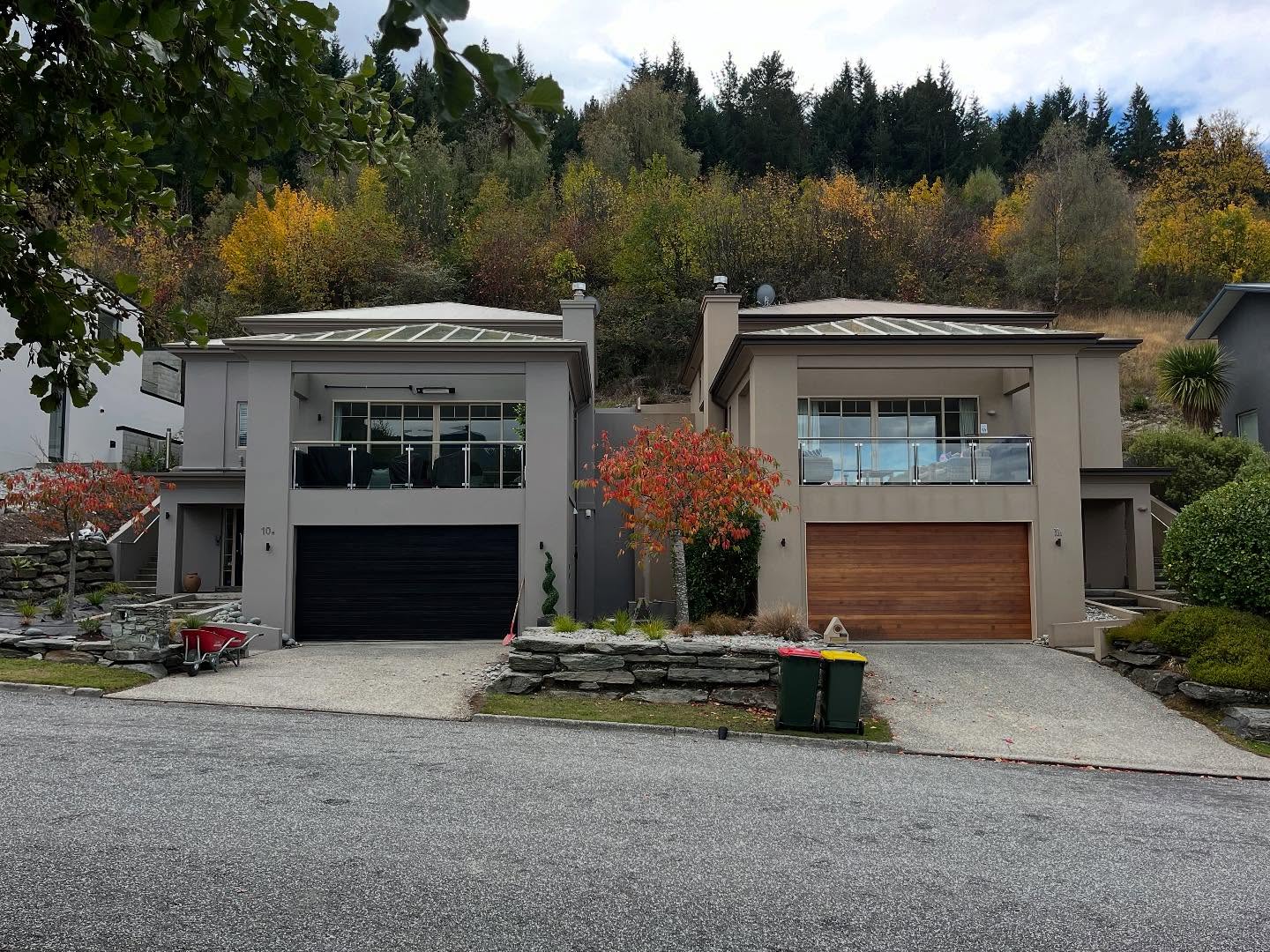 Freshly repainted modern duplex in neutral alpine tones